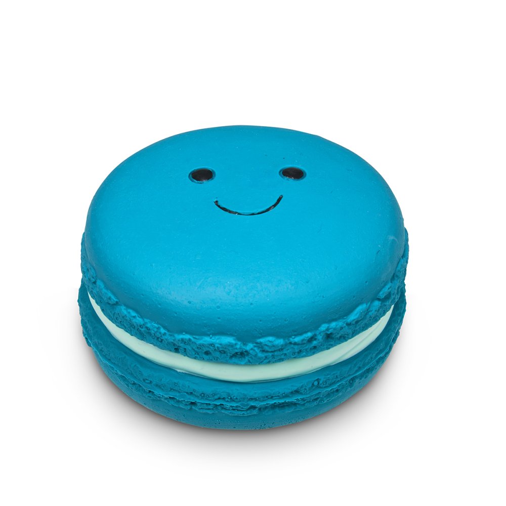 Blue macaron with a smiley face on a white background