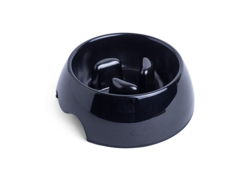 Black plastic pet bowl on a white background