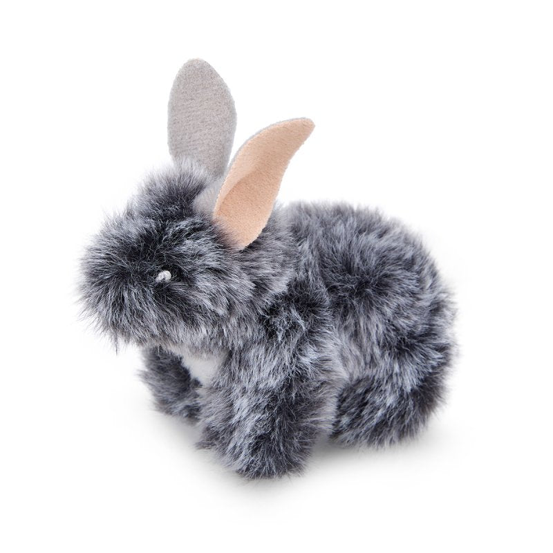 Plush toy resembling a rabbit with gray fur and tan ears on a white background