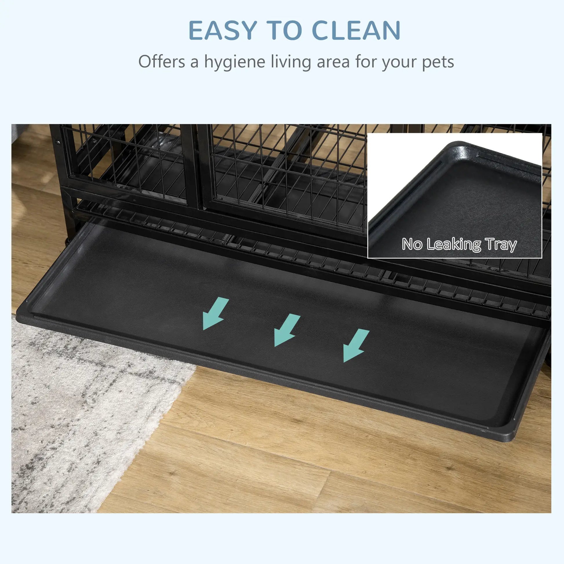 Black pet cage with a tray labeled 'No Leaking Tray' on a wooden floor.