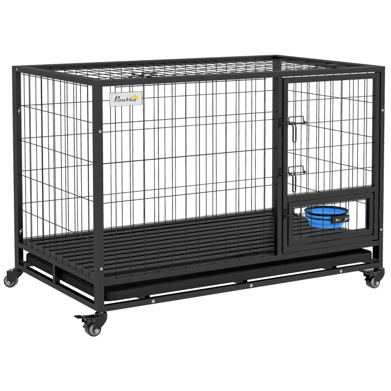 Large black metal pet cage with wheels on a white background