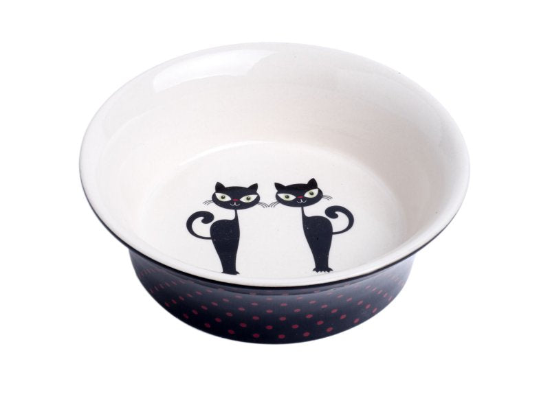 Cat-shaped bowl with black cats design on a white background