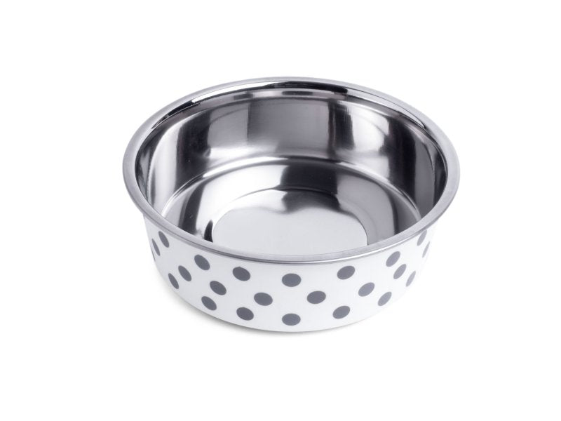 Stainless steel bowl with polka dot pattern on a white background