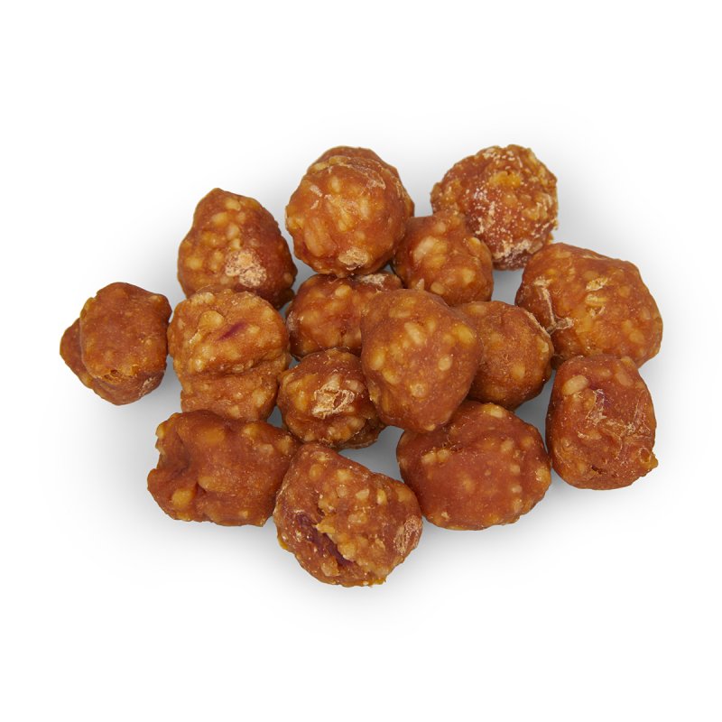 Cluster of brown spherical snacks on a white background