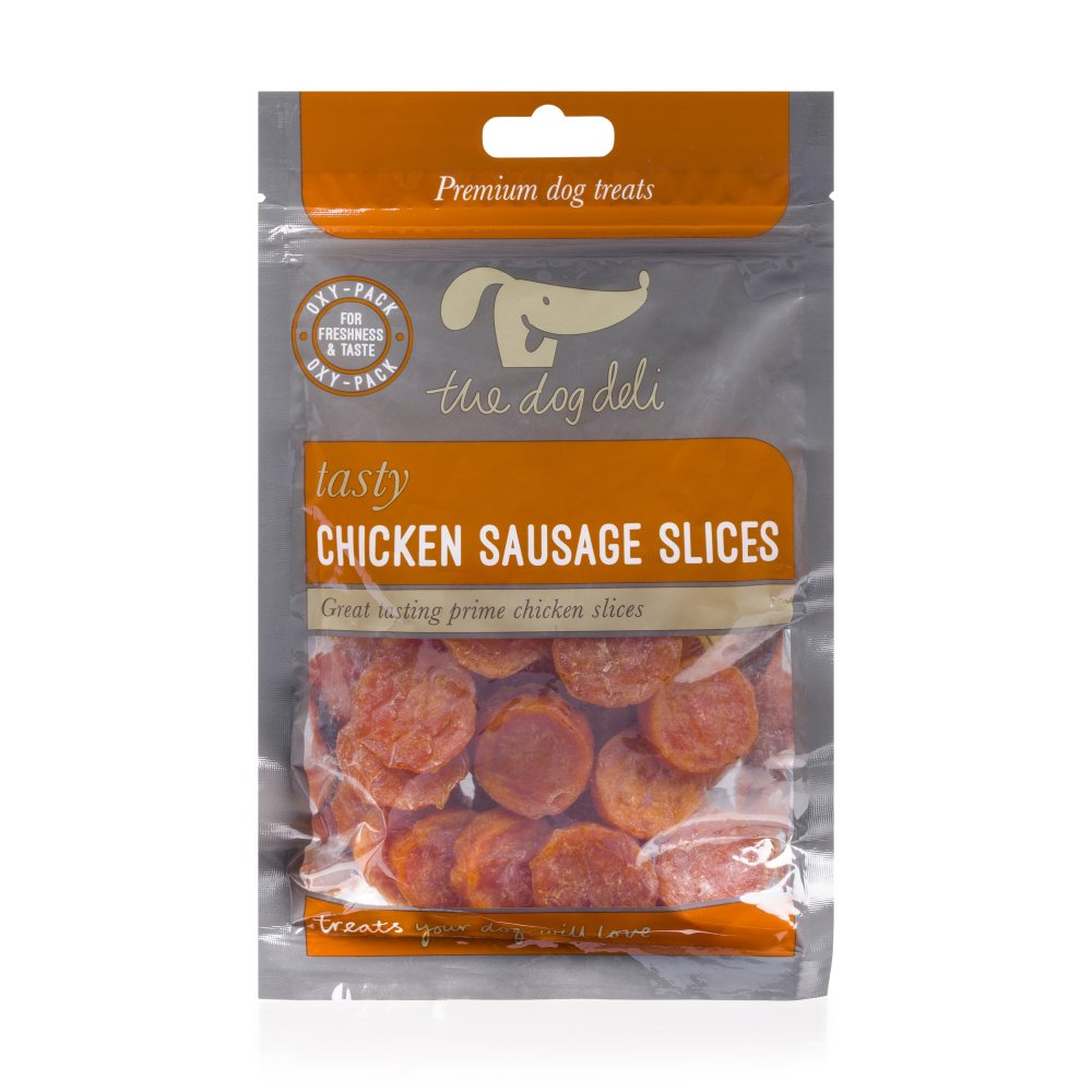 Package of 'the dog deli' chicken sausage slices on a white background
