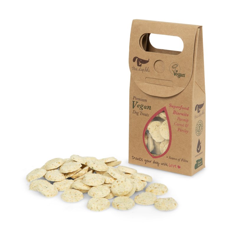 Kraft paper packaging of vegan dog treats with a handle on a white background