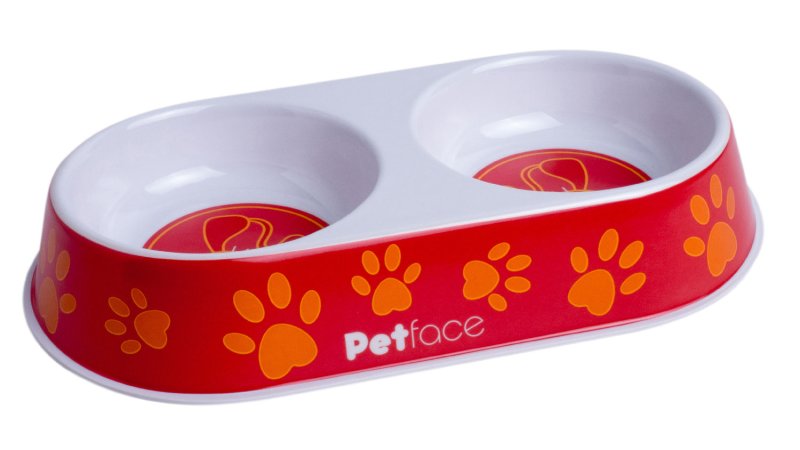 Red and white pet bowl with orange paw prints and 'Petface' branding on a white background