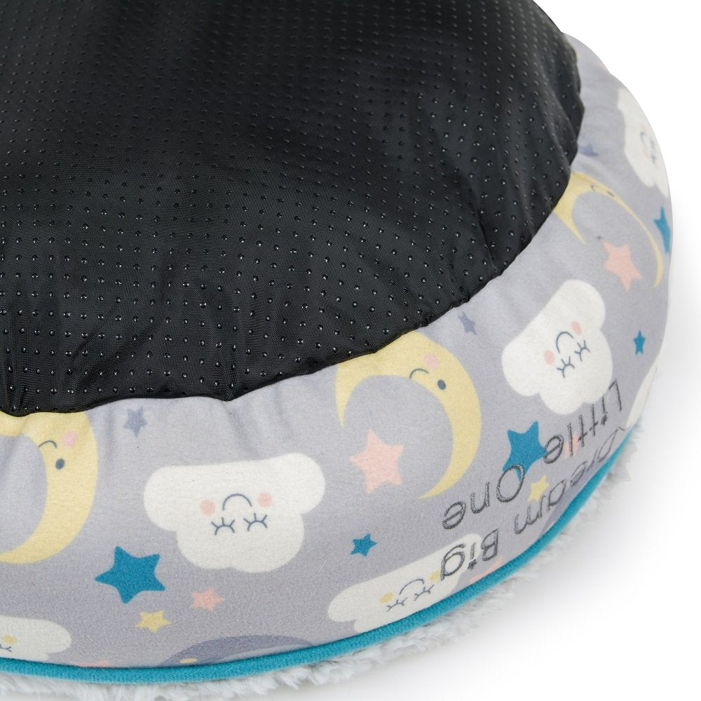 Pet bed with cloud and moon pattern on a gray background