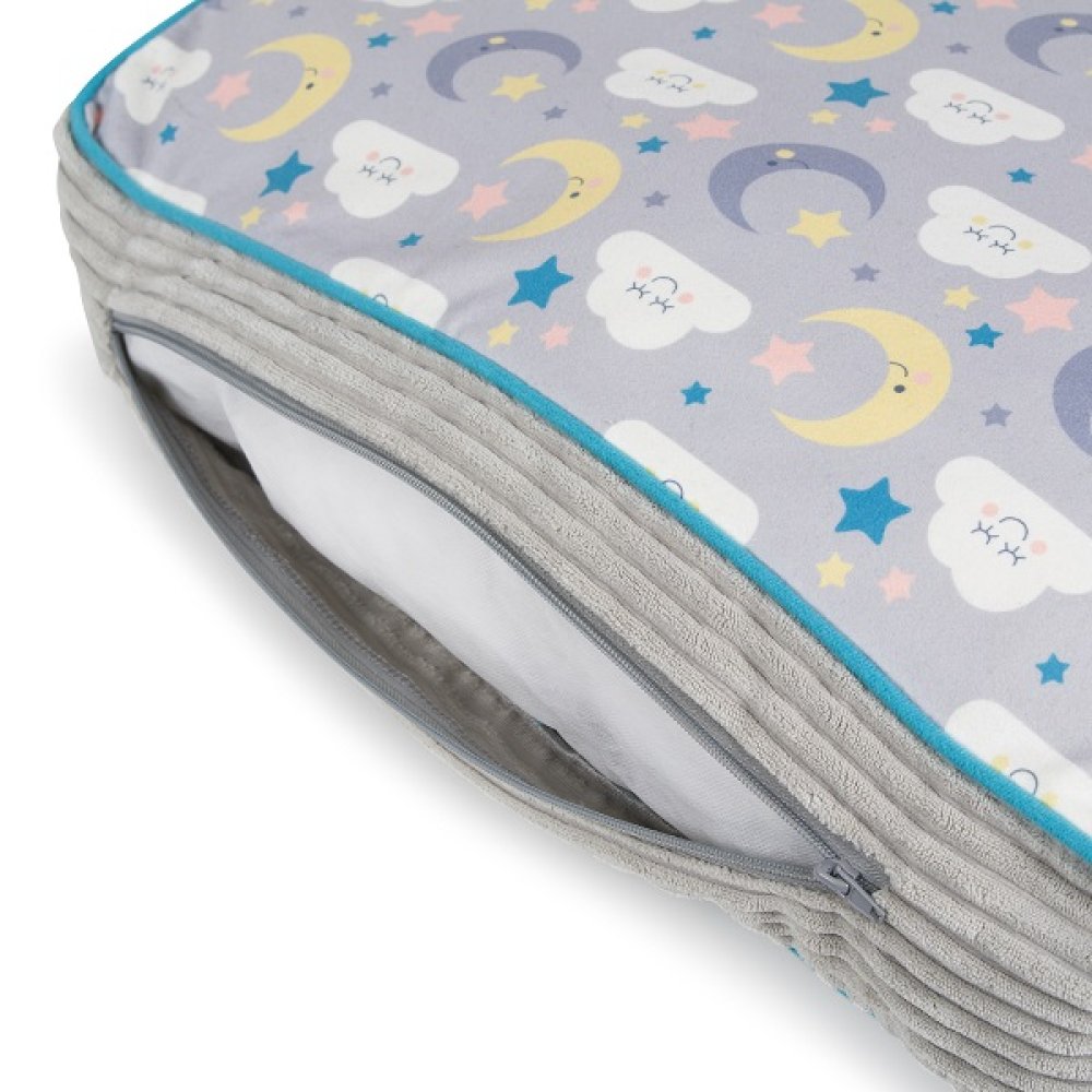 Pet pillow with cloud, moon, and star pattern on a white background