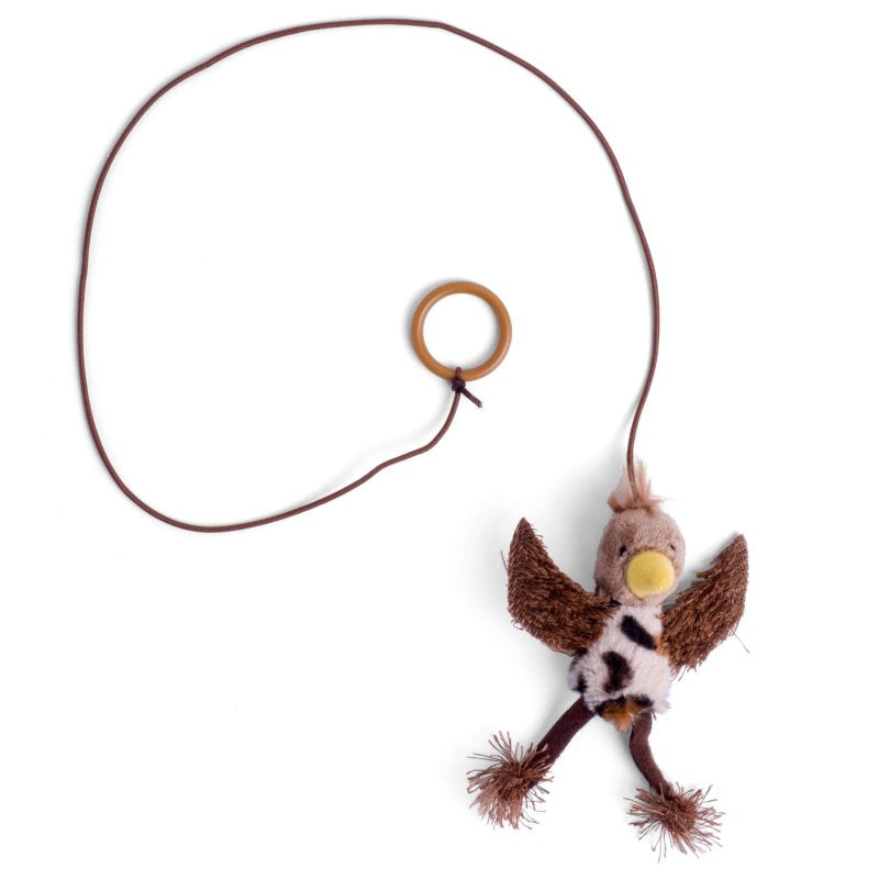Plush toy with a wooden ring on a white background