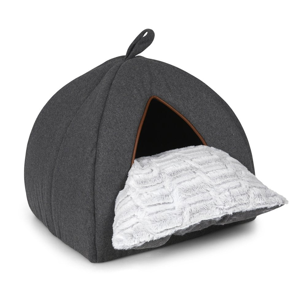 Gray pet bed with a textured white pillow on a white background