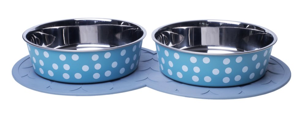 Two stainless steel bowls with blue polka dot patterns on a grey rubber mat.