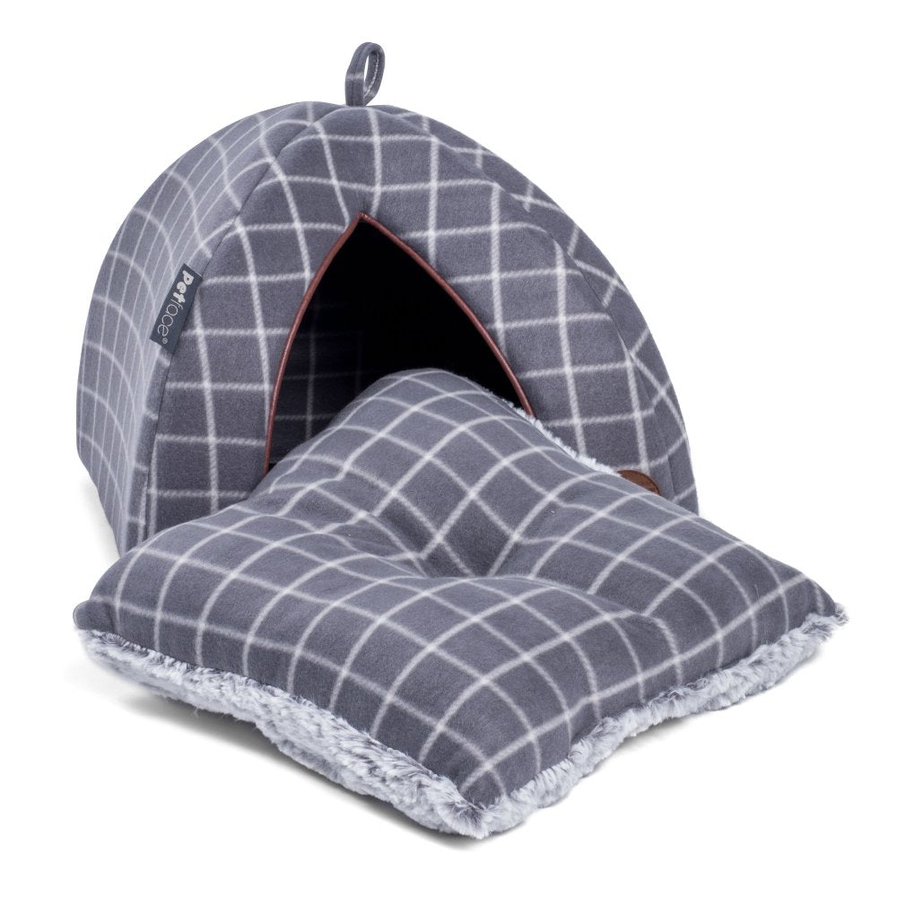 Gray checkered pet bed with matching pillow on a white background