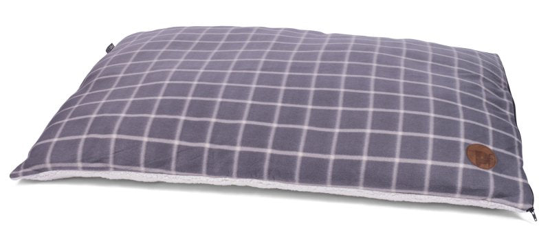 Plaid-patterned pillow with a brand logo on a white background