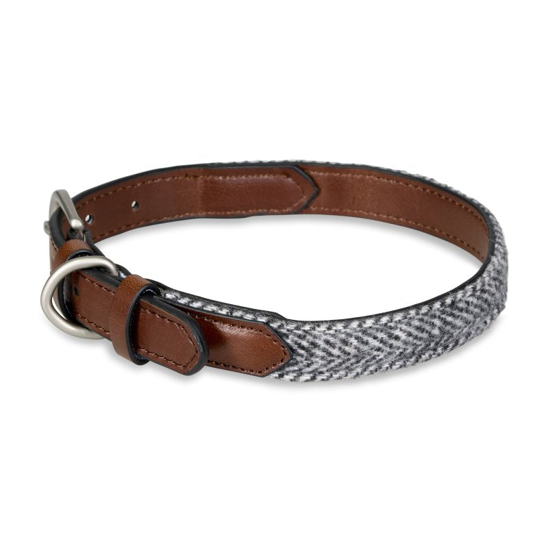 Dog collar with brown leather strap and gray patterned fabric on a white background