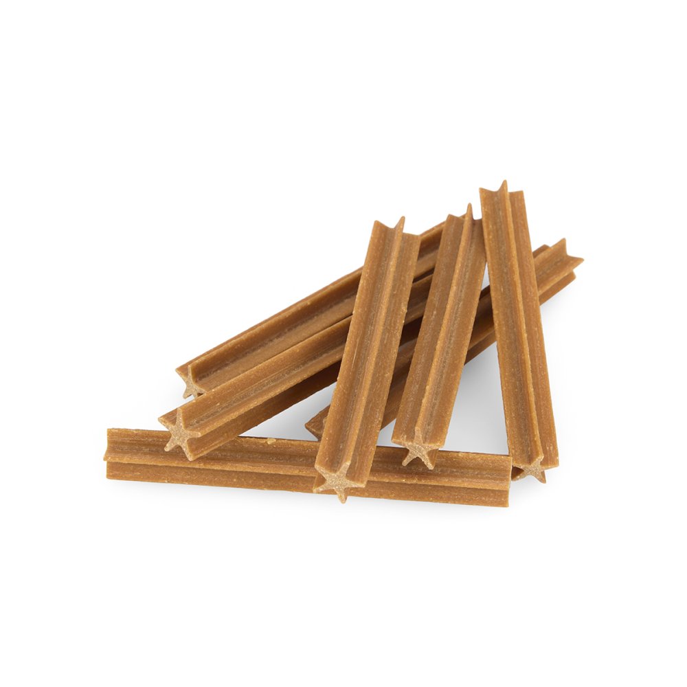 Stack of brown dog chew treats on a white background