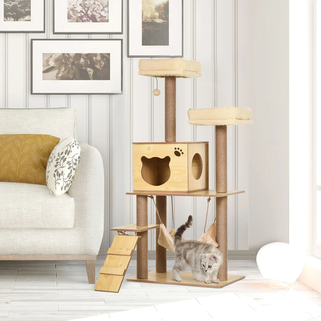 Cat tree with a cat climbing on it in a living room setting