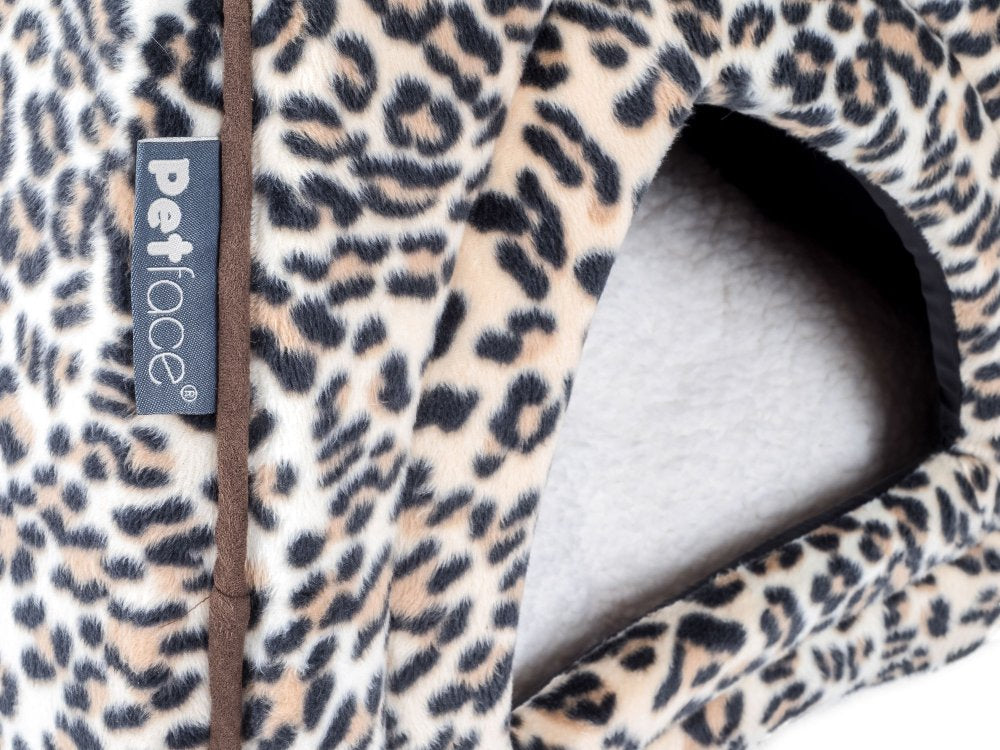 Leopard print pet bed with 'Petface' label on a white background
