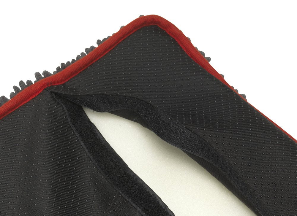 Close-up of a black and red textured product on a white background
