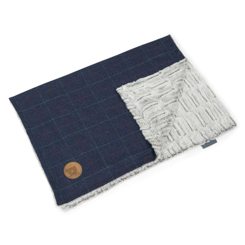 Blanket with blue checkered pattern and textured gray edge on a white background