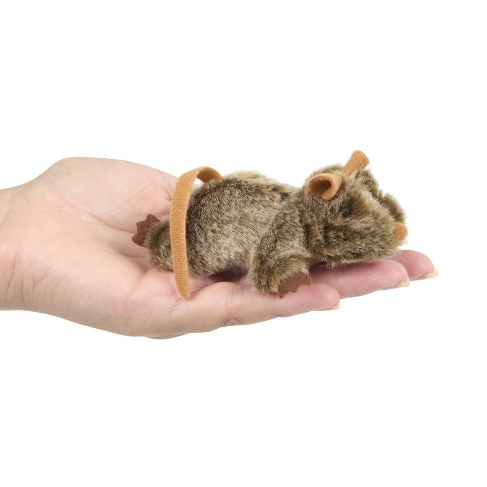 Plush toy mouse held in a hand on a white background