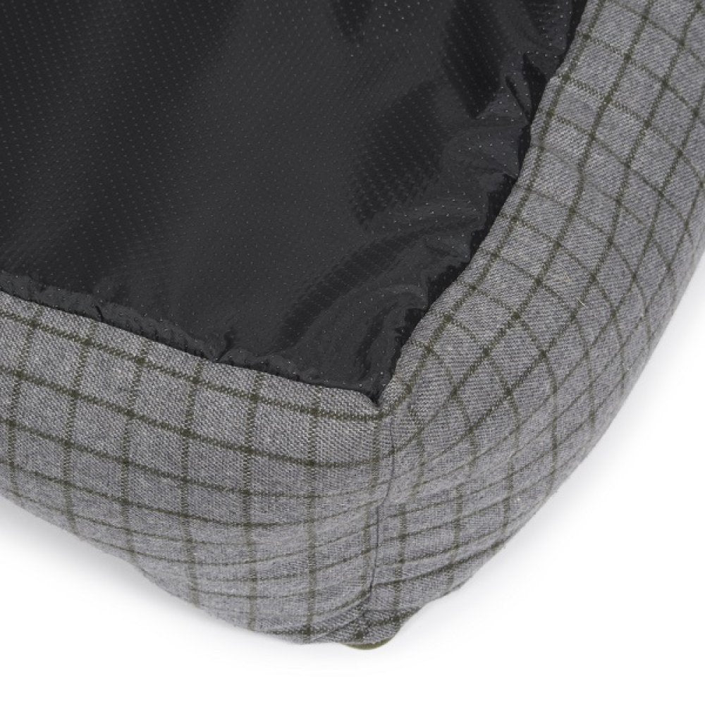 Gray checkered fabric corner with black base on a white background