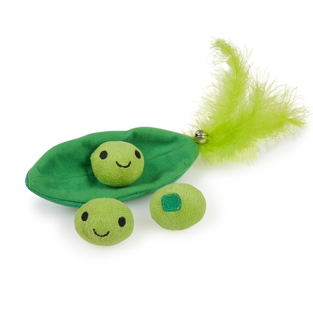 Green pea pod cat toy with two green balls and a feather on a white background