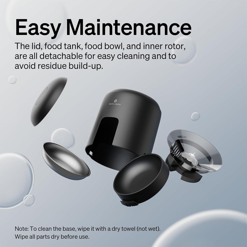 Black pet food dispenser with detachable parts on a gray background, emphasizing easy maintenance.