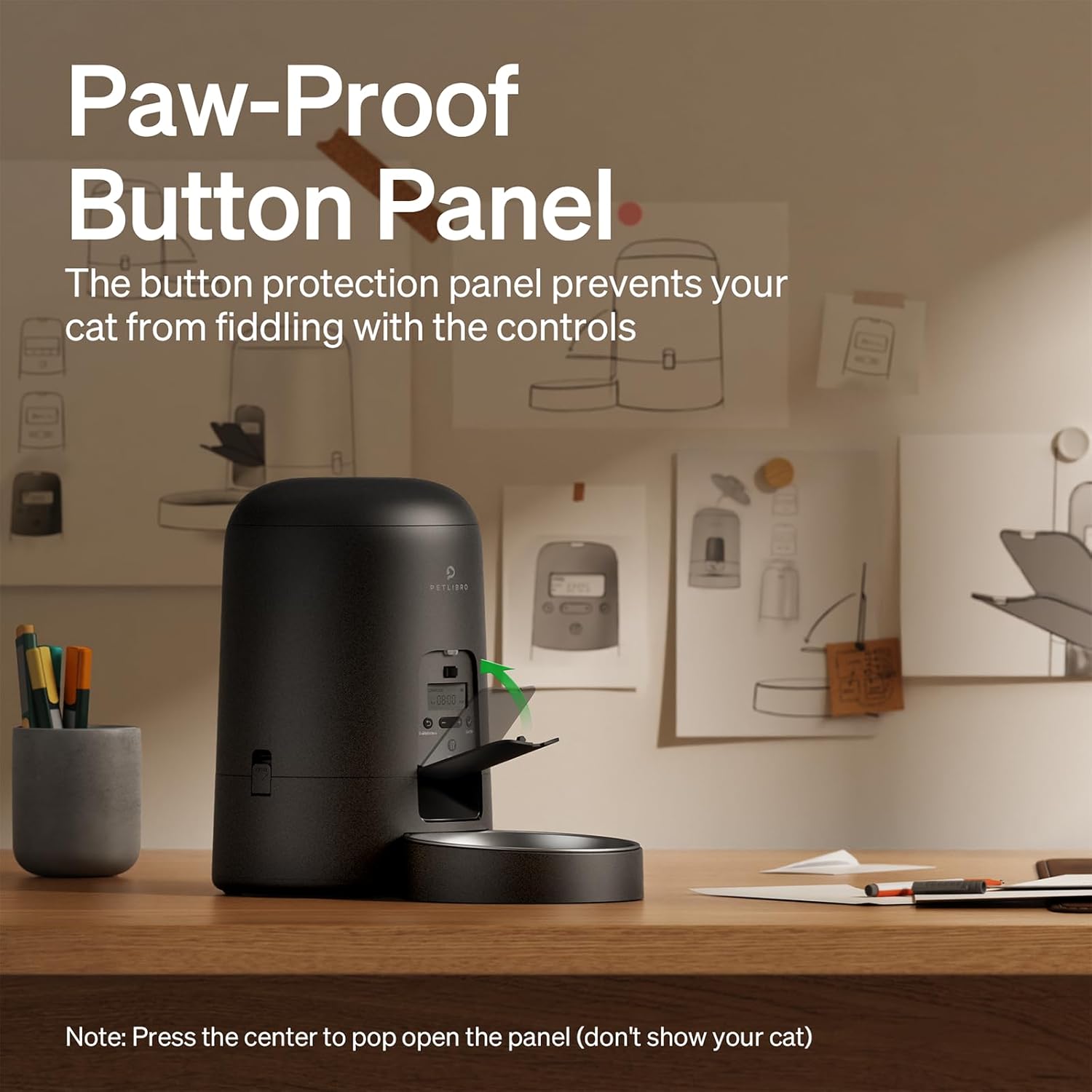 The Petlibro 2 Litre Automatic Pet Feeder paw-proof button panel. 