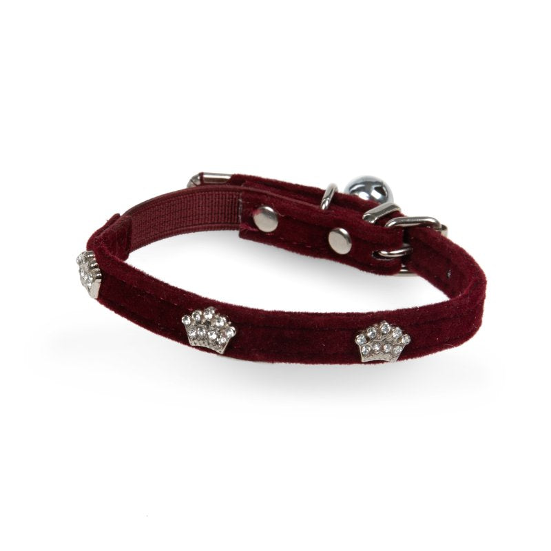 Red cat collar with silver paw-shaped decorations on a white background