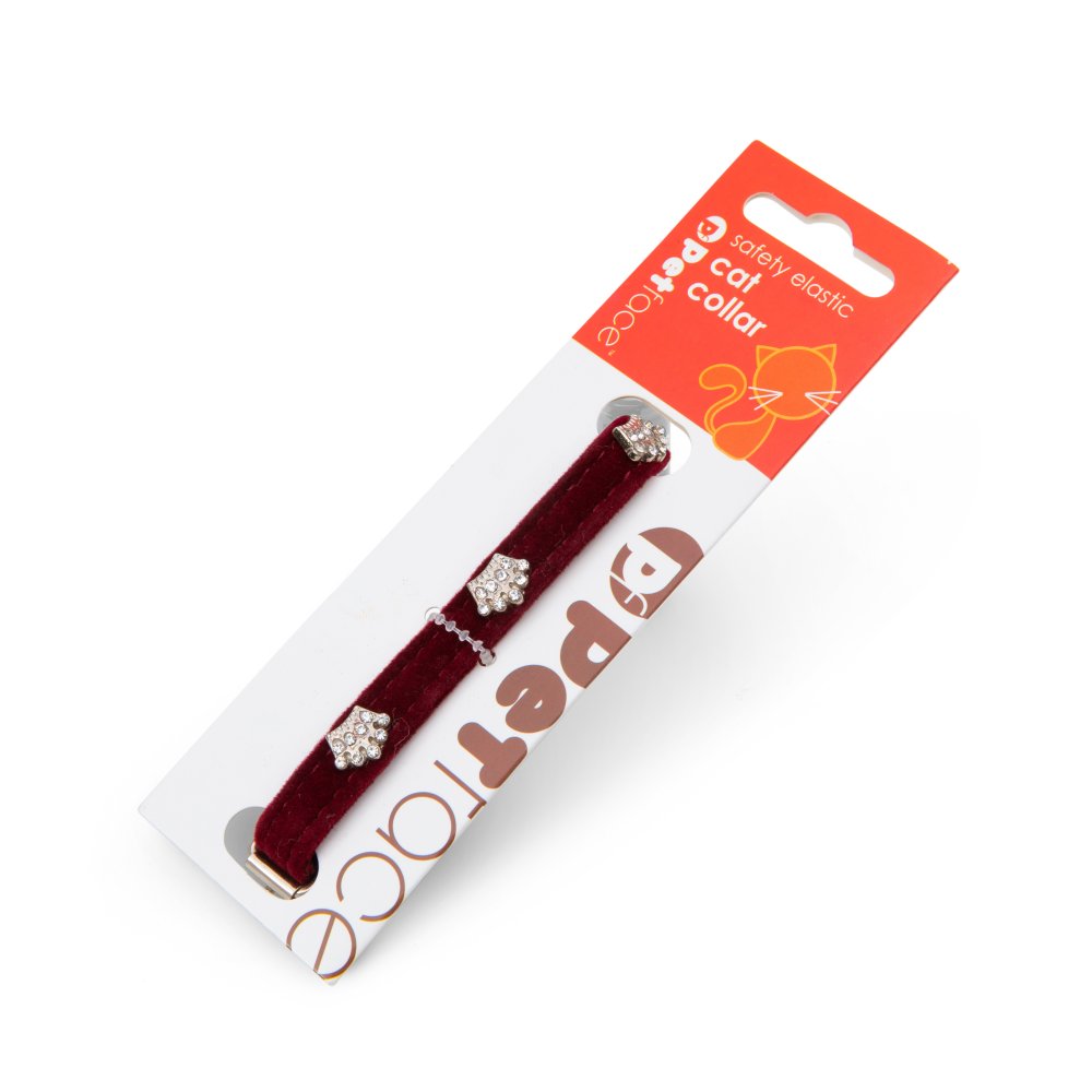Maroon cat collar with decorative elements on a white background