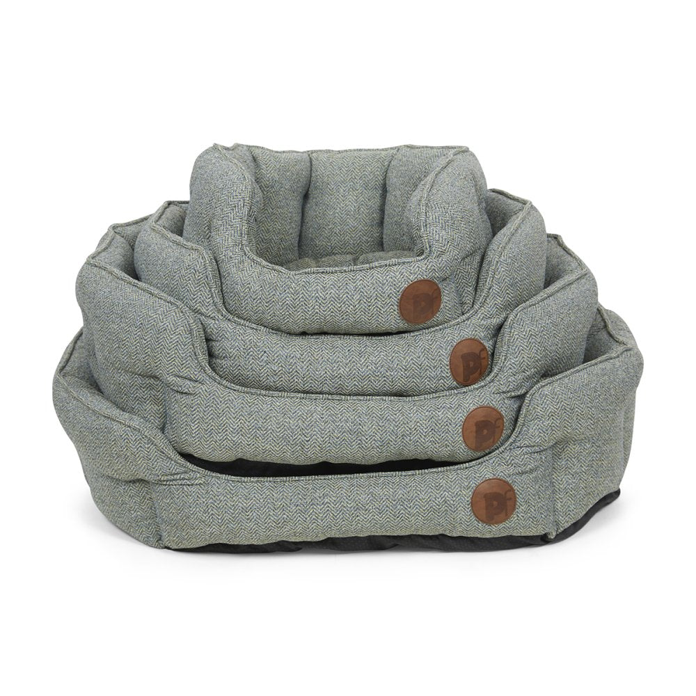 Set of gray fabric pet beds with brown buttons on a white background