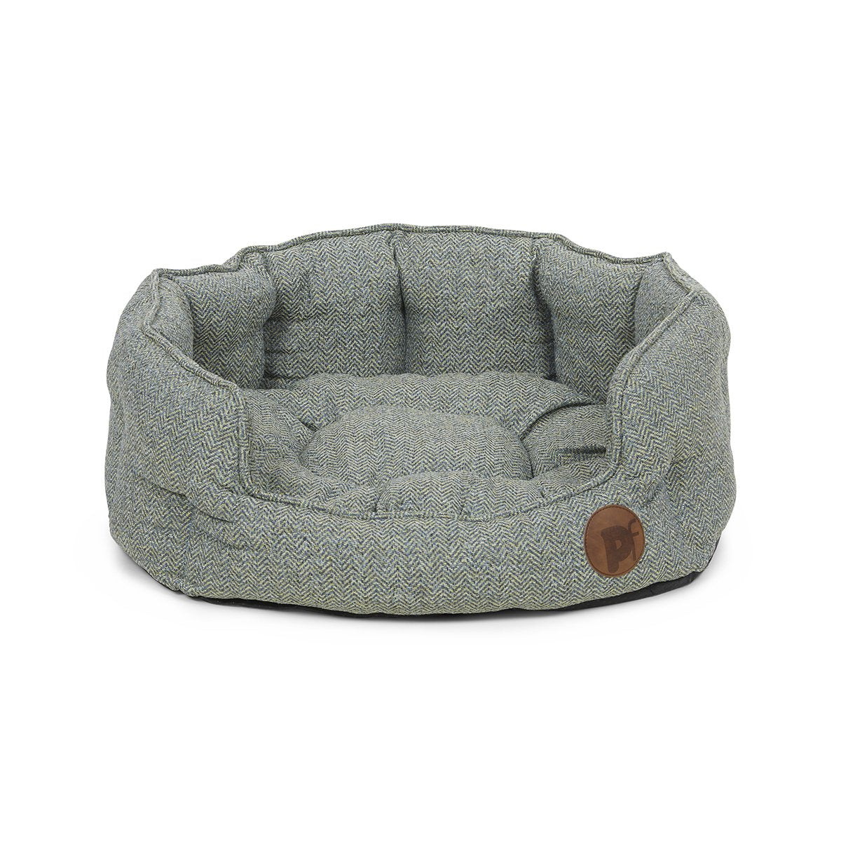 Gray pet bed with a brown leather tag on a white background