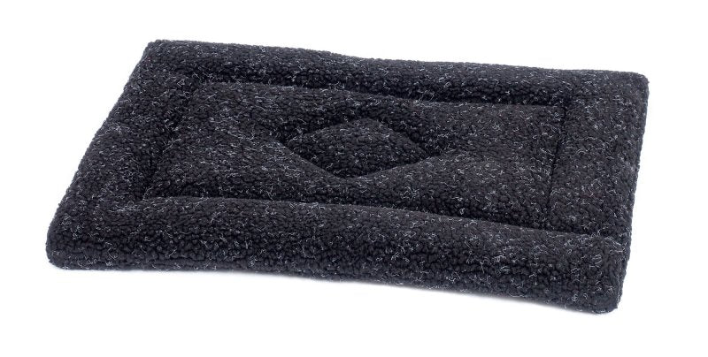 Black rectangular mat with textured surface on a white background