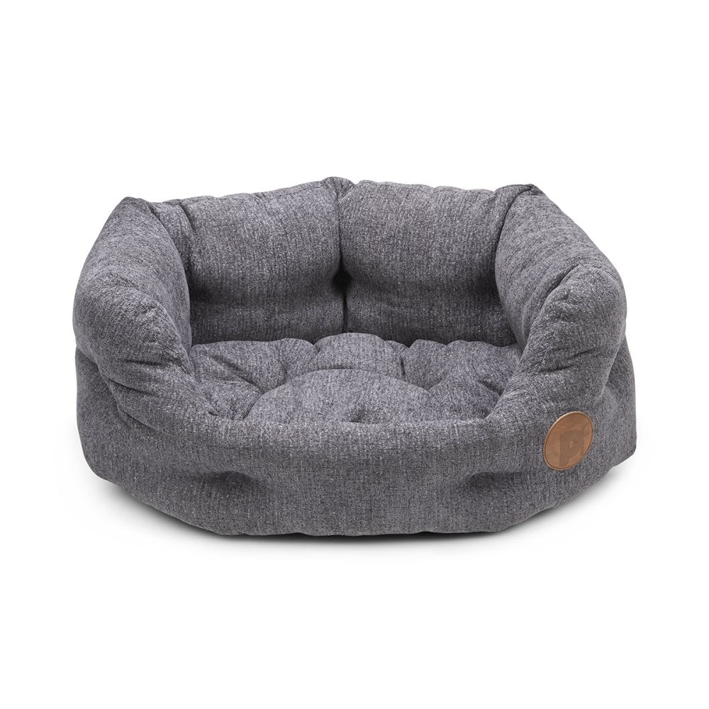 Gray pet bed with a brown patch on a white background
