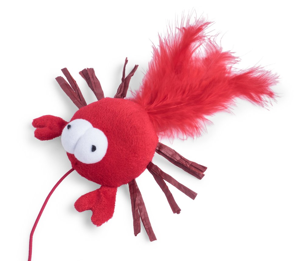 Red plush toy resembling a lobster on a white background