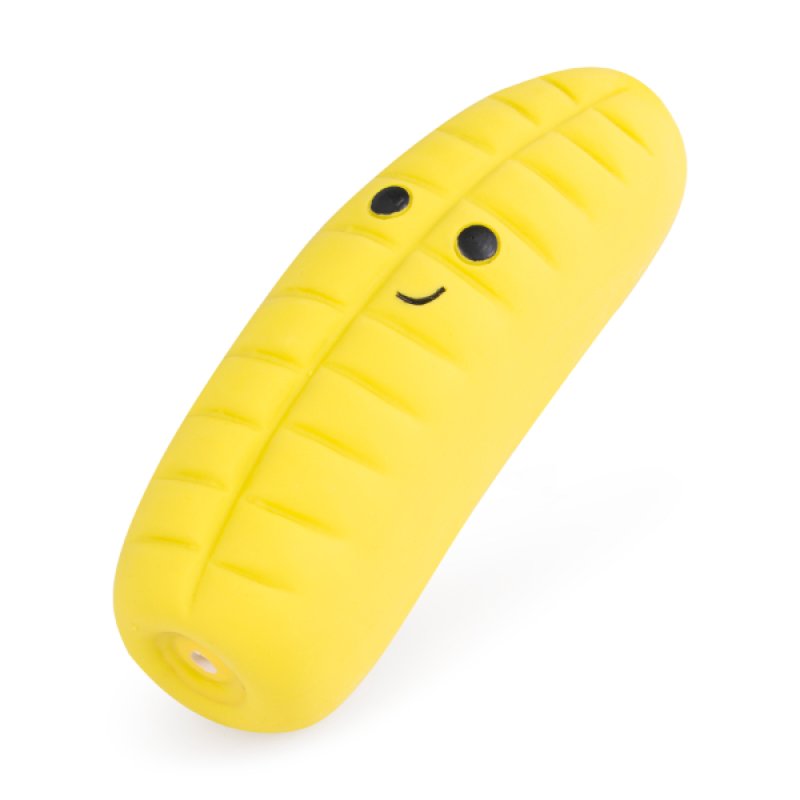 Yellow banana toy with a smiling face on a white background